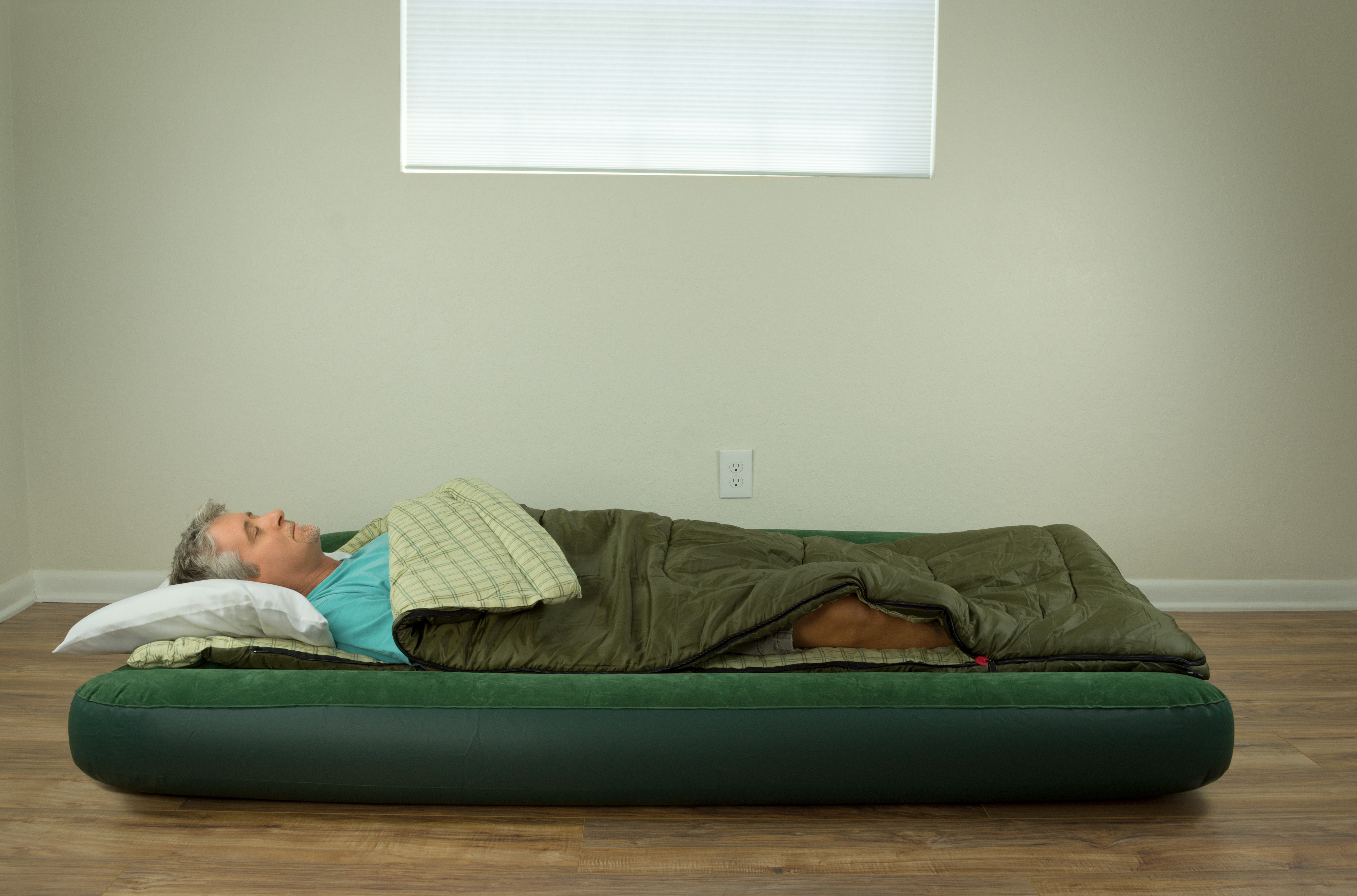 Man sleeping on a air mattress